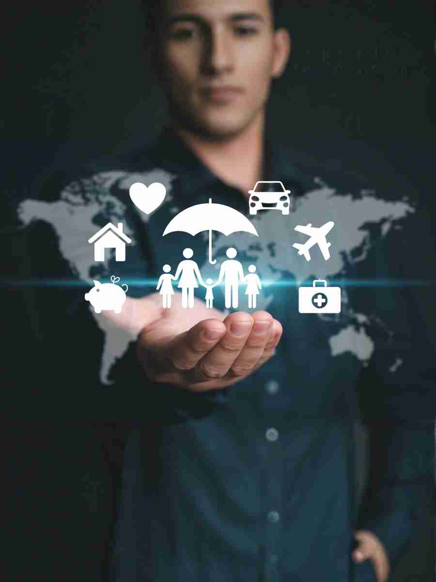 A man holding digital icons representing family, health, travel, home, and insurance protection, symbolizing workplace safety and risk management.